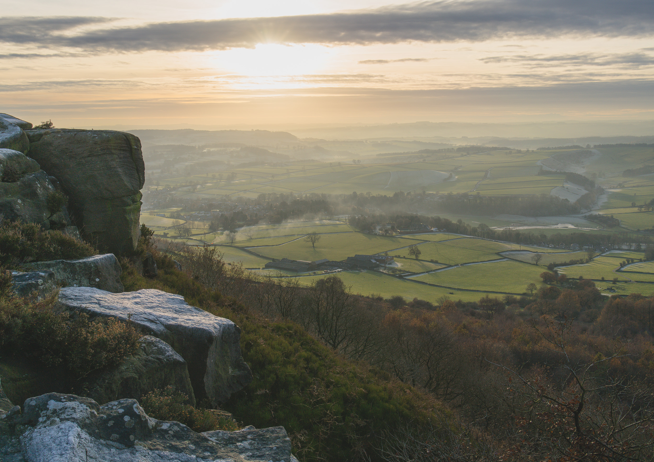 Baslow Edge Sunrise Fine Art Print featuring soft morning light over the rolling Derbyshire countryside.